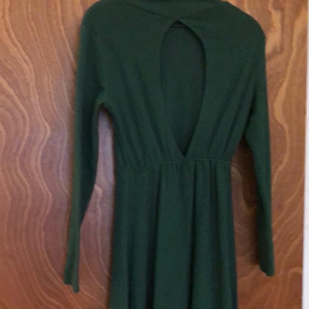 Green dress with diamond cut out back.